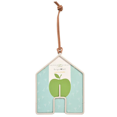 a house shaped bird feeder with a stake in the center to place an apple for birds to eat, hangs from a leather cord